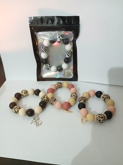 Handmade Elastic Rubber Bracelets with Printed Beads &amp; Charms.